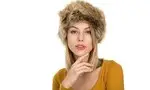 Beautiful woman wearing fur hat